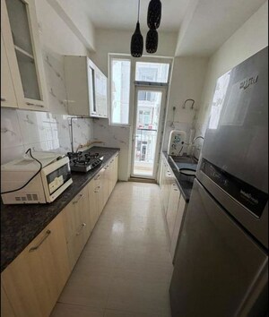 Kitchen in 2 BHK Apartment at Mona Greens, Ghazipur – for Rent