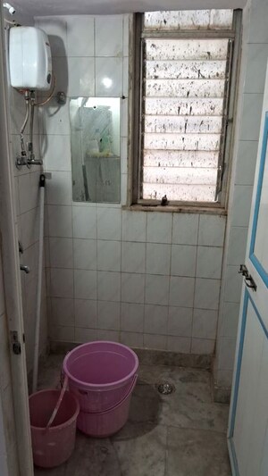Bathroom in 1 RK Apartment at Pranay Nagar CHS, Borivali West – for Rent