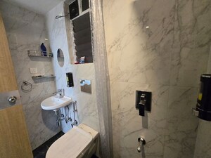 Bathroom in 1 BHK Apartment at Ruparel Ariana, Parel – for Rent