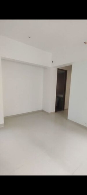 Room in 2 BHK Apartment at Kalpataru Immensa D, Kolshet Road – for Sale