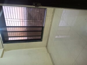 Bedroom in 1.5 BHK Apartment at Bhumiraj Twin Bridge, Ghansoli – for Rent
