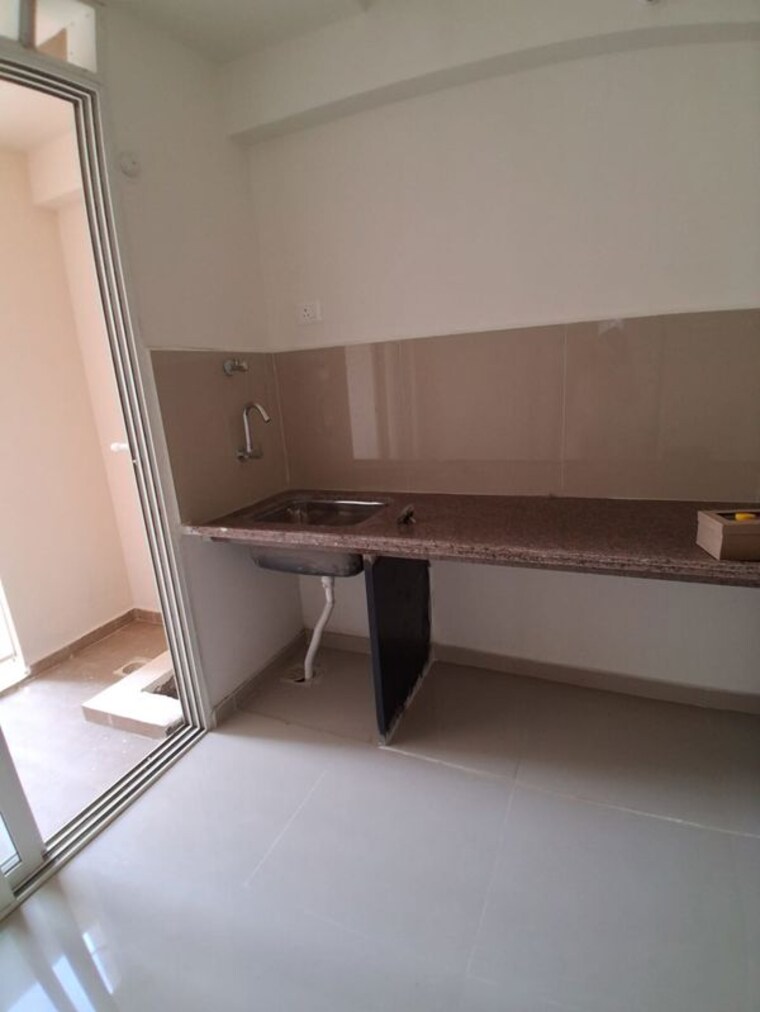 Kitchen, puraniks-elito-grand-central 2 Bedroom 980 Sq.Ft. Apartment In Vartak Nagar Thane 10203766