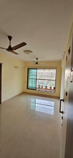 Living Room in 1 BHK Apartment at Surya Upvan CHS, Gawand Baug – for Rent