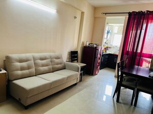 Living Room in 1 BHK Apartment at Aditya Celebrity Homes, Sector 76 – for Sale