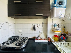 Kitchen in 1 BHK Apartment at Aditya Celebrity Homes, Sector 76 – for Sale