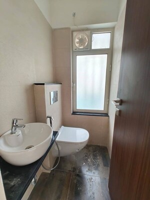 Bathroom in 1 BHK Apartment at Omkar Signet, Malad East – for Rent