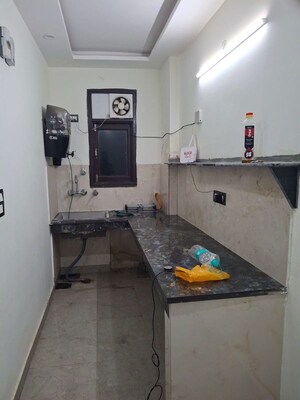 Kitchen in 2 BHK Builder Floor at Dwarka Mor – for Rent