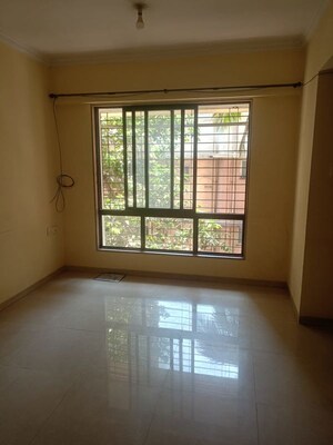 Room in 2 BHK Apartment at Mulund East – for Rent