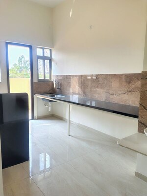 Kitchen in 4 BHK Villa at Kolte Patil Life Republic 24K Espada, Hinjewadi – for Sale