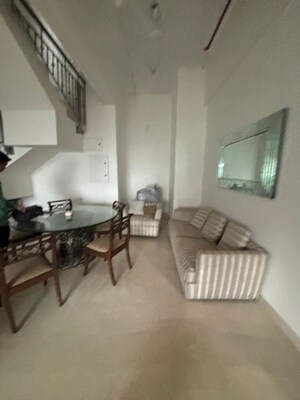 Living Room in 2 BHK Apartment at Indiabulls Blu, Worli – for Rent