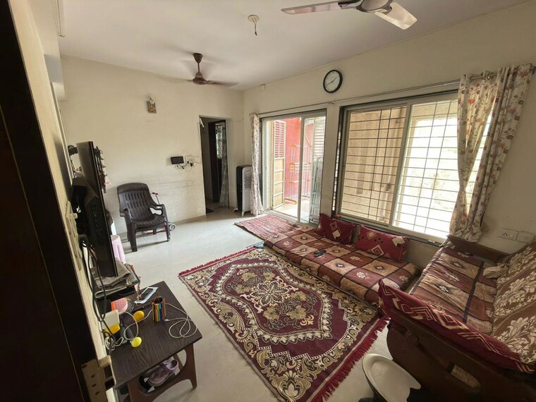 Living Room, mystique-wonders 1 Bedroom 658 Sq.Ft. Apartment In Narhe Pune 10254461