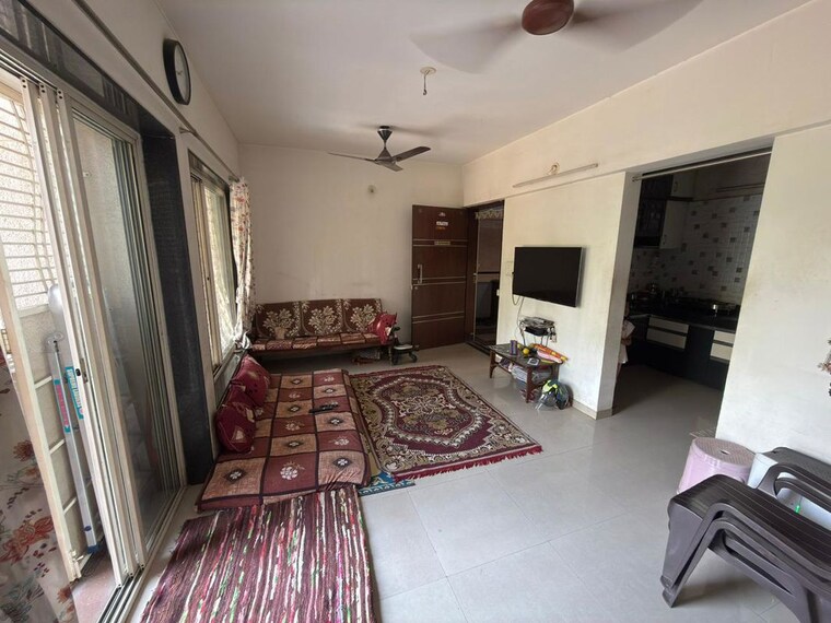Living Room, mystique-wonders 1 Bedroom 658 Sq.Ft. Apartment In Narhe Pune 10254461