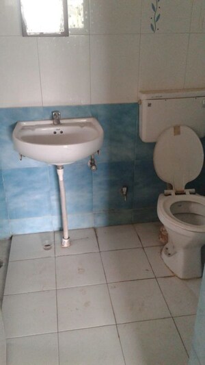 Bathroom in 2 BHK Apartment at Tejovalay Apartment, Karve Nagar – for Rent