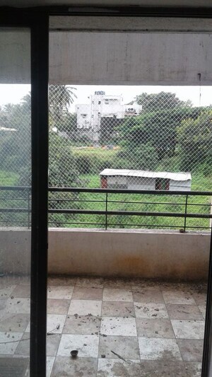 Terrace in 2 BHK Apartment at Tejovalay Apartment, Karve Nagar – for Rent