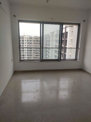 Room in 2 BHK Apartment at Kalpataru Aura, Ghatkopar West – for Rent
