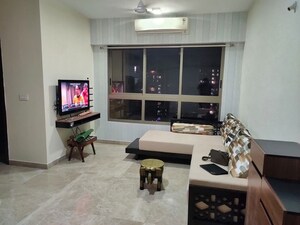 Living Room in 2 BHK Apartment at Lodha Luxuria, Majiwada – for Rent