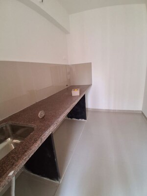 Kitchen in 2 BHK Apartment at Lodha Luxuria, Majiwada – for Rent