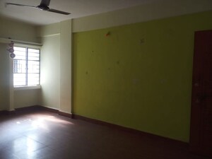 Living Room in 1 BHK Apartment at Vanaz Corner, Kothrud – for Rent