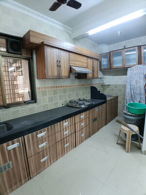 Kitchen in 2 BHK Apartment at Shri Sai Sagar Complex, Kalwa – for Sale
