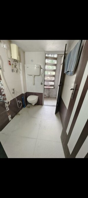 Attached Bathroom in 2 BHK Apartment at Shri Sai Sagar Complex, Kalwa – for Sale