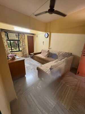 Living Room in 1 BHK Apartment at Anand Milan Society, Santacruz West – for Rent