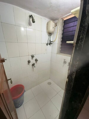 Bathroom in 1 BHK Apartment at Anand Milan Society, Santacruz West – for Rent