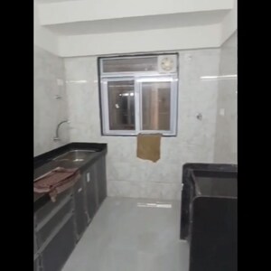 Kitchen in 3 BHK Apartment at Amrapali Platinum, Sector 119 – for Sale