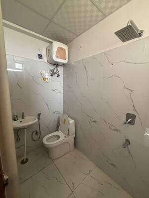 Bathroom in 4 BHK Apartment at Mansarovar – for Sale