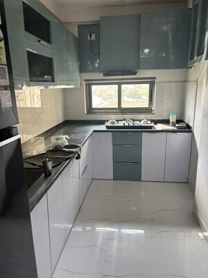 Kitchen in 4 BHK Apartment at Mansarovar – for Sale