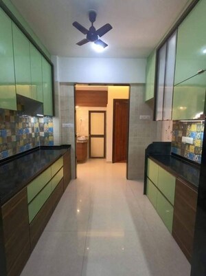 Kitchen in 2 BHK Apartment at Punyarthi Tower, Kalyan West – for Sale