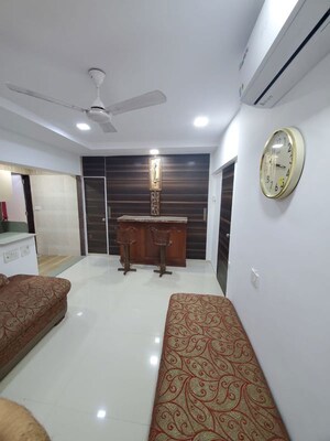 Living Room in 1 BHK Apartment at Yamuna Villa, Andheri West – for Rent