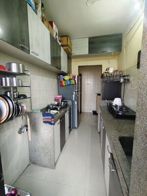 Kitchen in 2 BHK Apartment at Coral Heights, Kavesar – for Rent