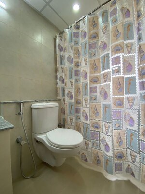 Bathroom in 3 BHK Apartment at Bhartiya Nikoo Homes Phase 2, Thanisandra Main Road – for Rent