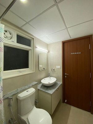 Bathroom in 3 BHK Apartment at Bhartiya Nikoo Homes Phase 2, Thanisandra Main Road – for Rent