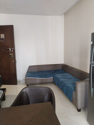 Living Room in 2 BHK Apartment at JP Unity Tower, Lower Parel – for Rent
