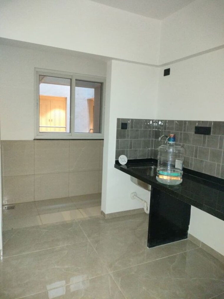 Kitchen, pristine-allure 2 Bedroom 950 Sq.Ft. Apartment In Kharadi Pune 10289408