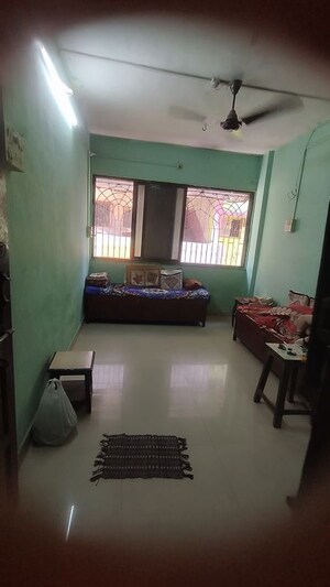 Living Room in 1 BHK Apartment at Ghanshyam Complex, Dombivli West – for Rent