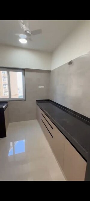 Kitchen in 2 BHK Apartment at Beauty Greenstone Heritage, Fort – for Rent