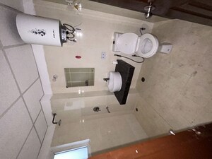 Bathroom in 3.5 BHK Apartment at Paramount Floraville, Sector 137 – for Rent