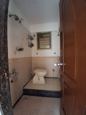 Bathroom in 2 BHK Apartment at Sai Tharwanis Heights, Sanpada – for Rent