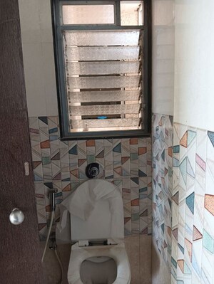 Bathroom in 2 BHK Apartment at Ashapura Asha Icon, Dombivli East – for Rent