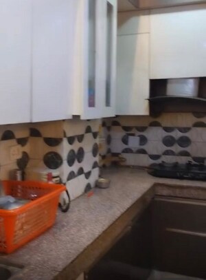 Kitchen in 2 BHK Apartment at Milan Earth, Raj Nagar Extension – for Sale