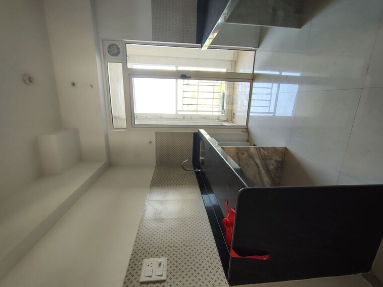 Kitchen, lodha-amara-tower-24-and-25 2 Bedroom 800 Sq.Ft. Apartment In Kolshet Road Thane 10290448