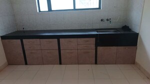 Kitchen in 2 BHK Apartment at DNV Elite Gardens, Aundh – for Rent