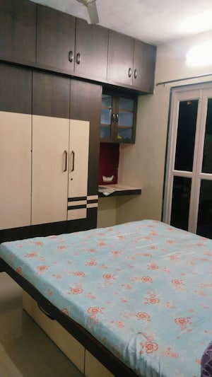 Bedroom in 2 BHK Apartment at Shirine Garden Co Operative Housing Society Ltd, Aundh – for Rent