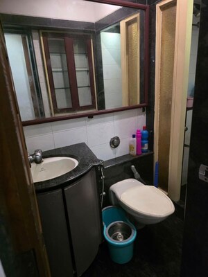 Bathroom in 3 BHK Apartment at Oshiwara – for Rent