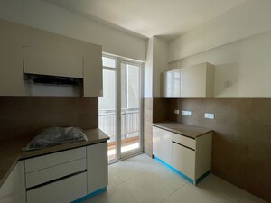 Kitchen in 3 BHK Apartment at M3M Crown, Sector 111 – for Sale