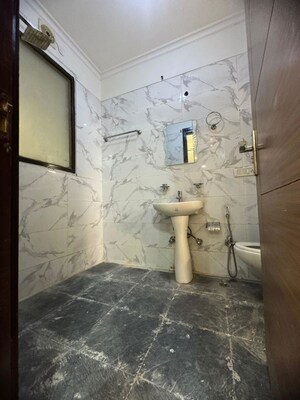 Bathroom in 2 BHK Builder Floor at Chattarpur – for Rent