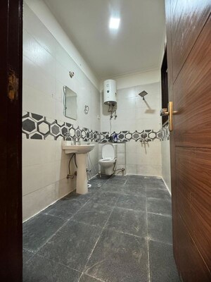 Bathroom in 2 BHK Builder Floor at Chattarpur – for Rent