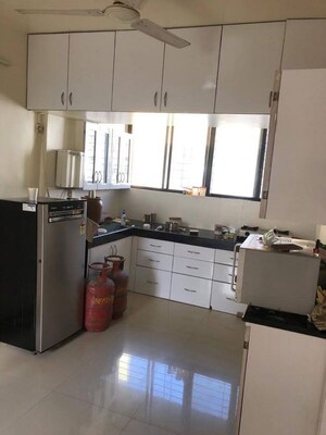 Kitchen in 2 BHK Apartment at Radha Housing Society, Aundh – for Rent